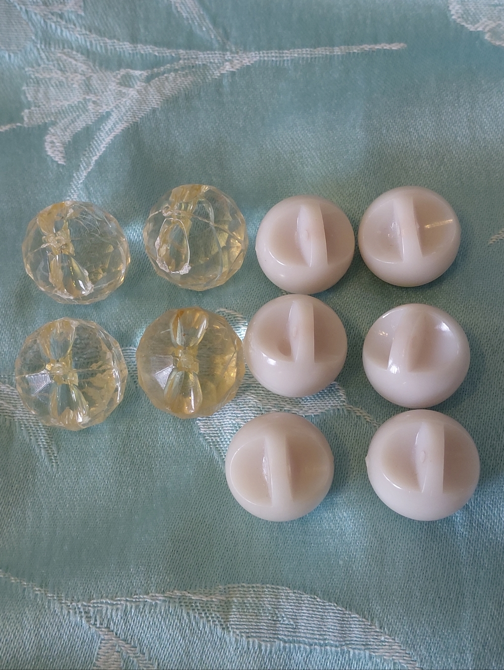 Set of Clear Faceted and Cream Round Shank Buttons